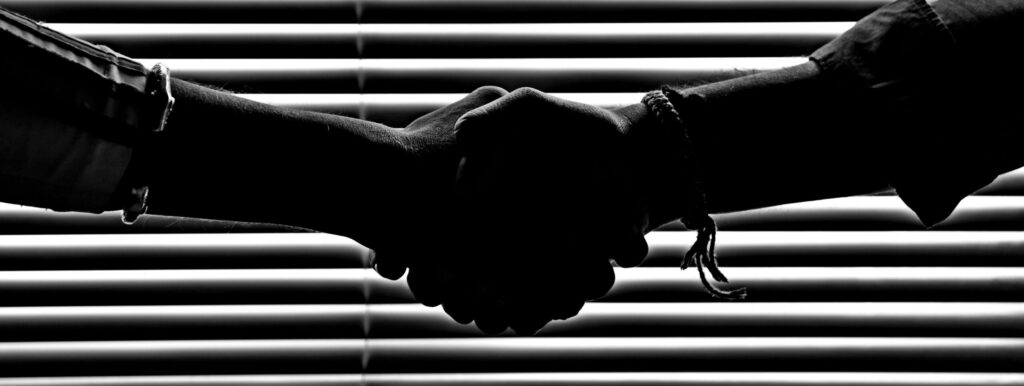 two people shaking hands
